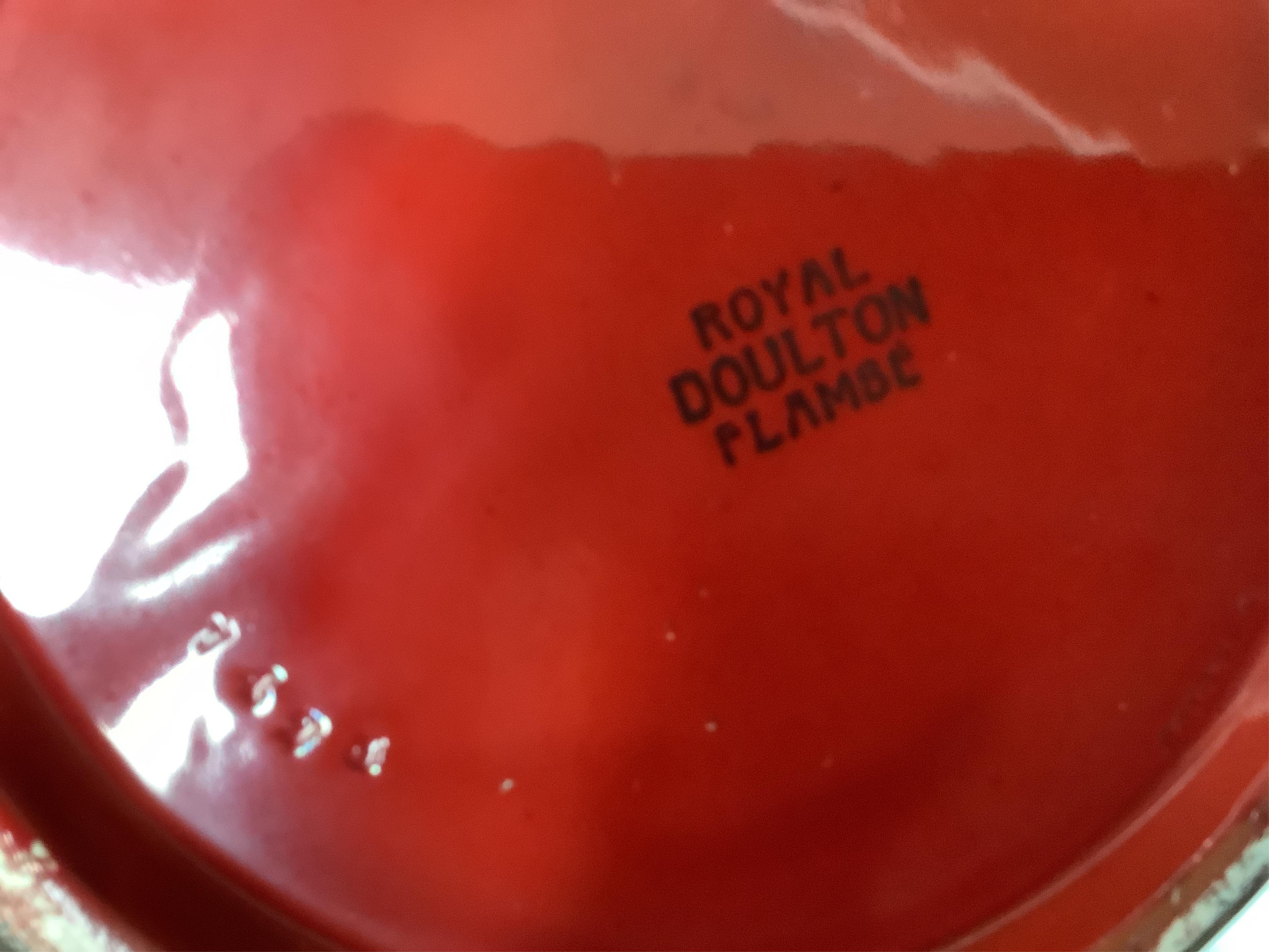 A large Doulton flambe vase decorated with ships, 29cm high